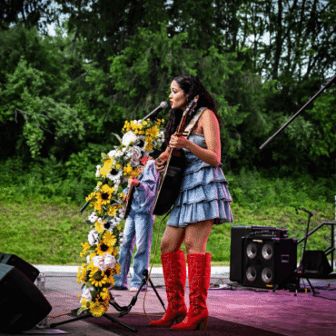 Madison Curbelo singing on stage