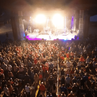 Lights flooding packed crowd